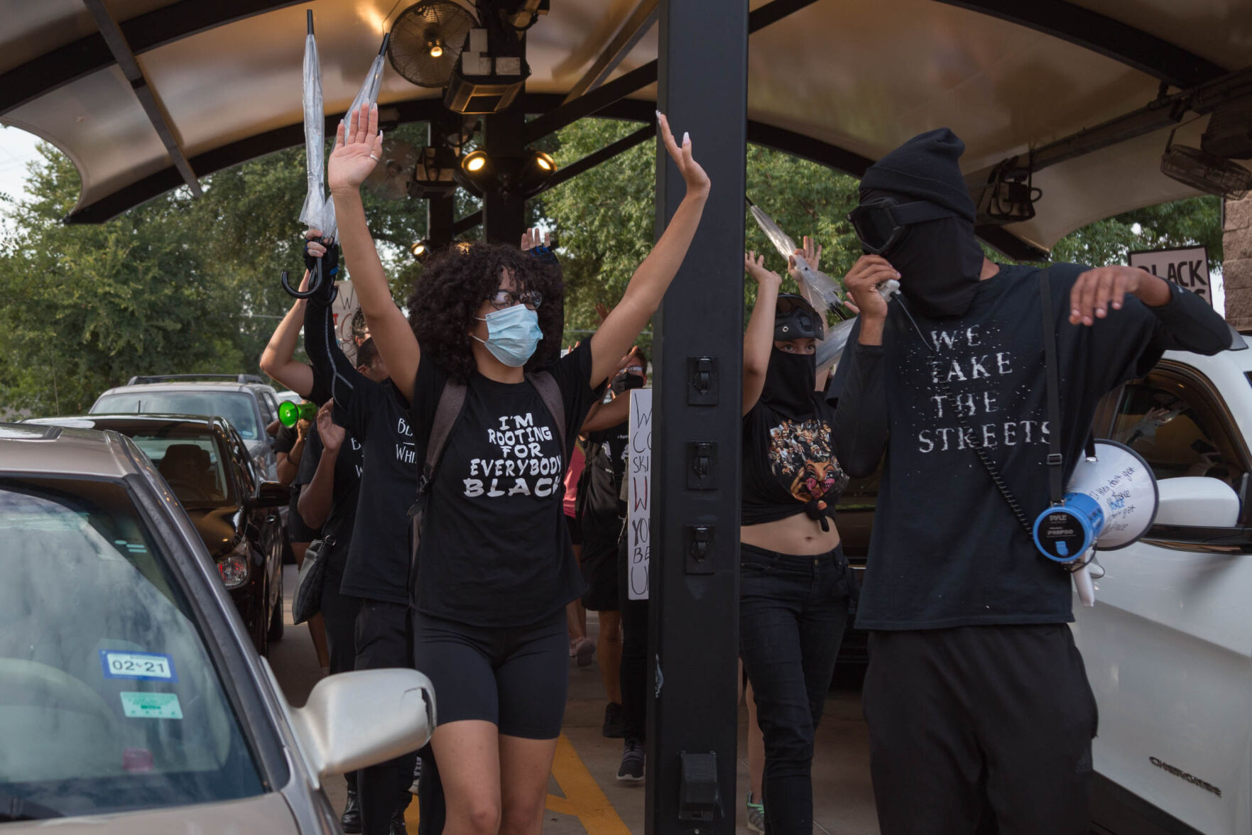 Photos: Activist group We Take The Streets holds march through Arlington in third month of protests